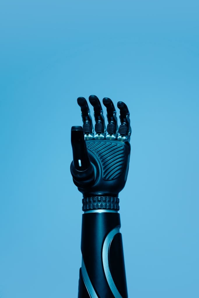 Prosthetic Arm on Blue Background